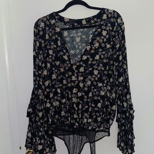 Free People - “She’s Dainty” Black Floral Print Longsleeve Thong Bodysuit